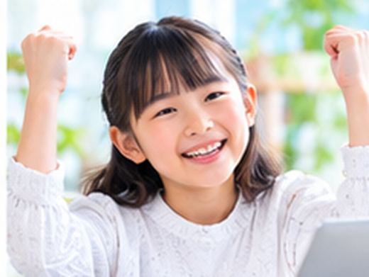 結果を見て喜ぶ生徒